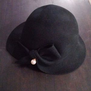 Bellady hat one sz 57 cm.color black100% wool new with tag